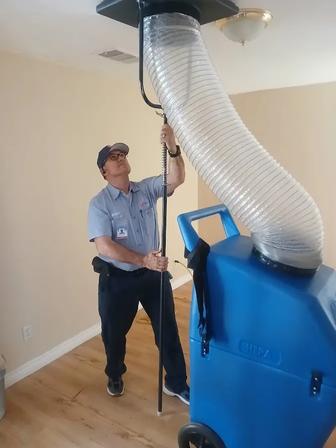 HVAC Installation technician using HEPA equipment in Olive